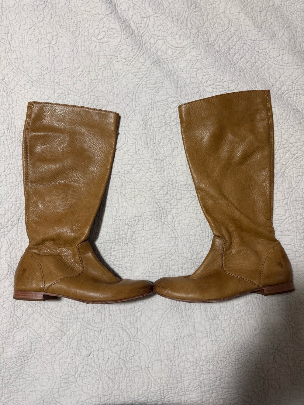 Frye boots with zip up and braid detail on heel